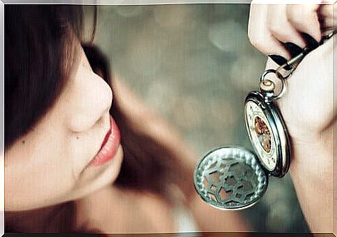 Woman looking at a clock thinking about how to survive a demanding routine