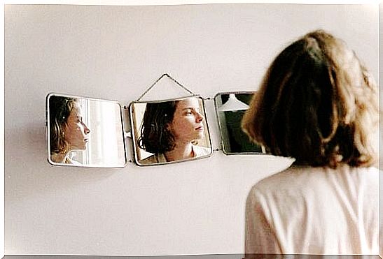 Girl looking in the mirror