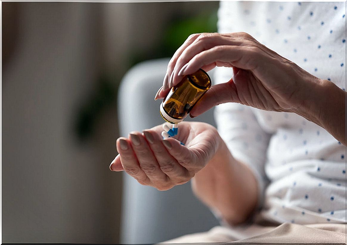 Woman taking antibiotic