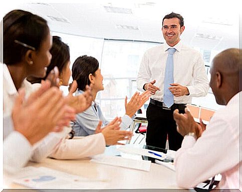 Employees giving approval to a boss