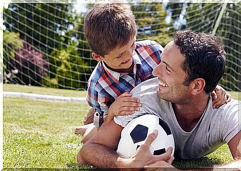 Father and son with ball