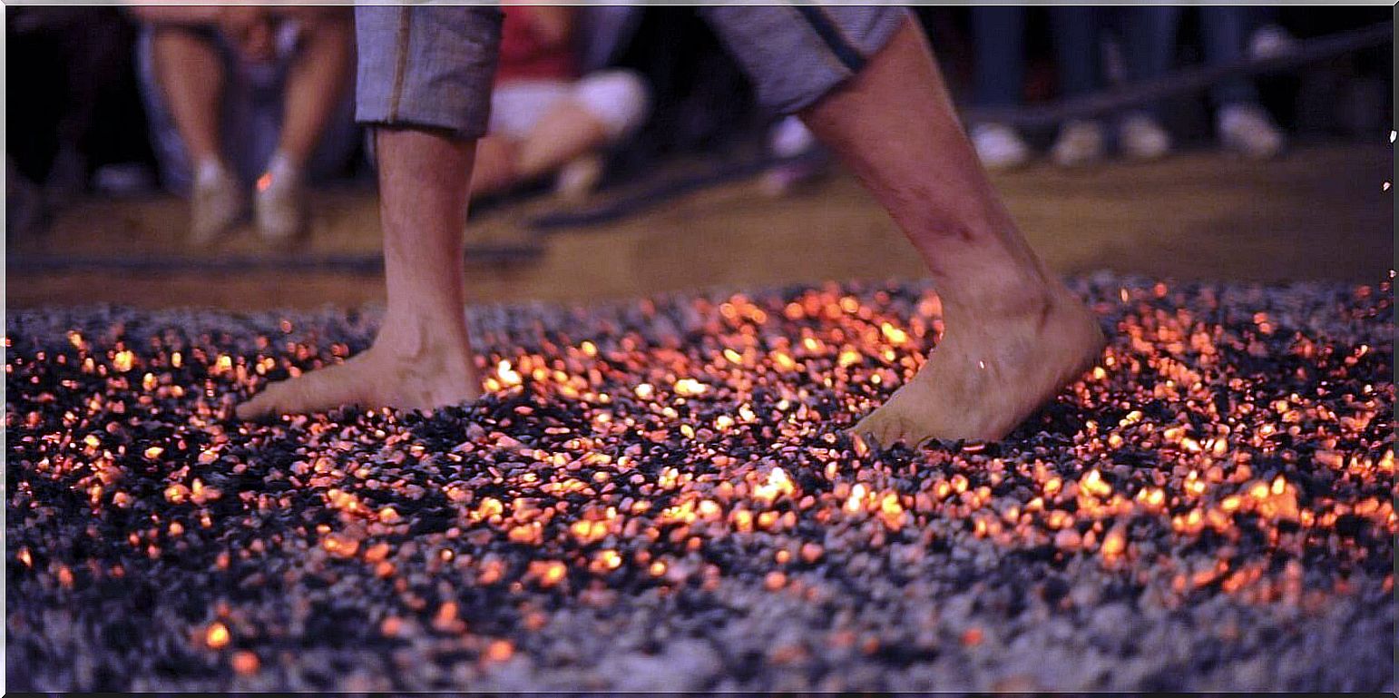 person practicing firewalking