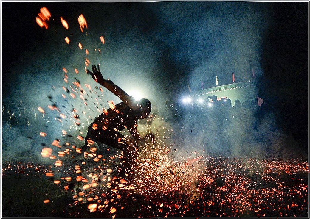 person carrying out firewalking