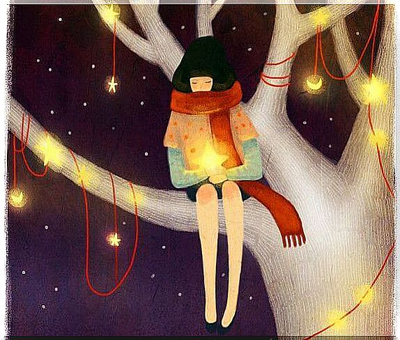 girl in tree with stars