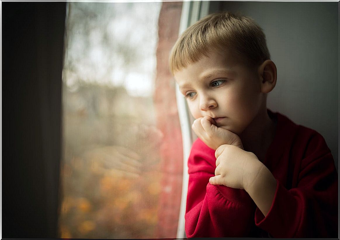 Worried child at the window