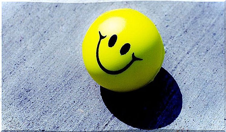 Yellow ball with a smiling face