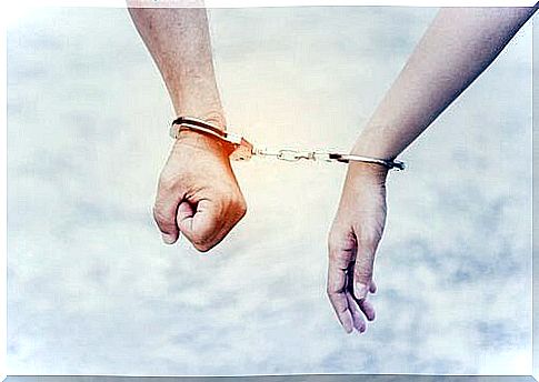 Handcuffed Hands Representing Dependent Personality Disorder