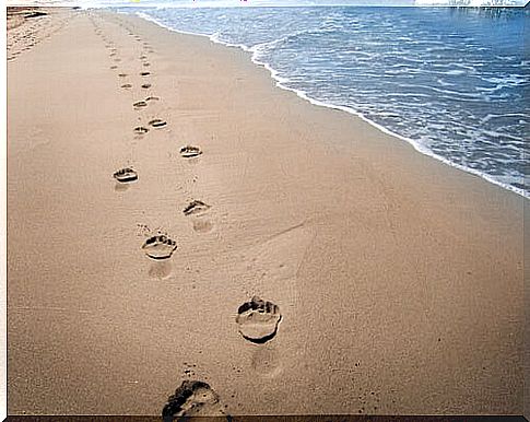 Footprints of a person in the sand