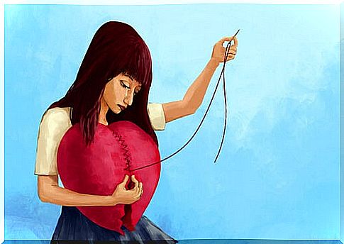 Woman mending her broken heart