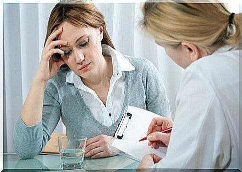 Worried woman talking to her doctor