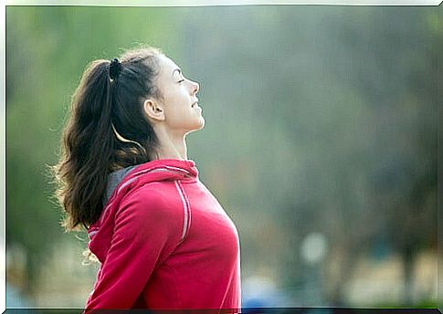 Woman breathing thinking about the importance of emotional intelligence in sport