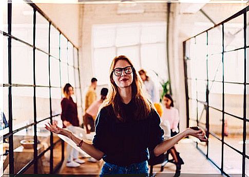 Woman meditating at workplace