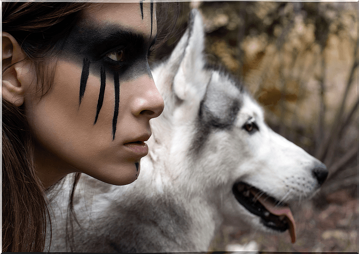 Face of a woman with a wolf to represent the archetype of the wild woman